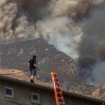 Lightning, hail, high winds and flood warnings: Southern California hit by severe fire weather