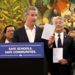 "We're not North Korea," Newsom signs bills to limit immigration attacks at schools and mask federal agents.