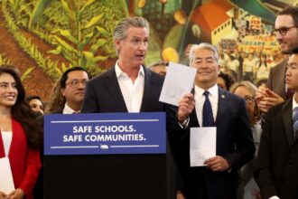 "We're not North Korea," Newsom signs bills to limit immigration attacks at schools and mask federal agents.