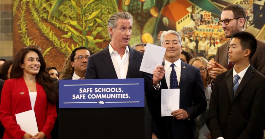 "We're not North Korea," Newsom signs bills to limit immigration attacks at schools and mask federal agents.
