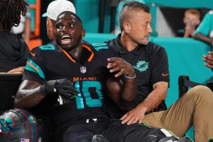 Dolphin's "Tyreek Hill" "laughing through pain" as he faces a season-ending knee injury