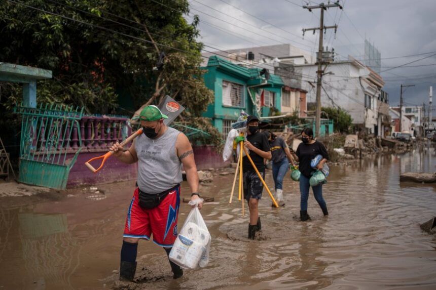 Landslides and floods cut off 300 communities in Mexico, leaving dozens dead and missing