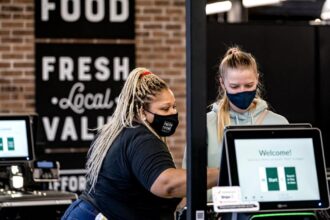 Long Beach has restricted self-checkout lanes. Big retailers aren't happy about this