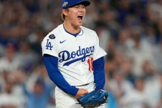 Sports Report: Dodgers Clean the Reds