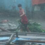 Typhoon Fanwon pummels the Philippines, killing 8 people and displacing 1.4 million people