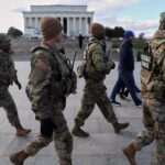 US suspends all asylum decisions after National Guard shooting