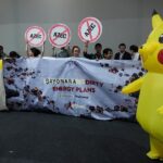 Demonstrators wearing Pikachu costumes demand Japan end fossil fuel financing at UN climate change conference