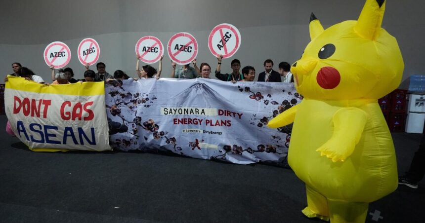 Demonstrators wearing Pikachu costumes demand Japan end fossil fuel financing at UN climate change conference