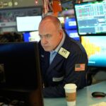 Stock prices set new records on holiday-shortened trading days